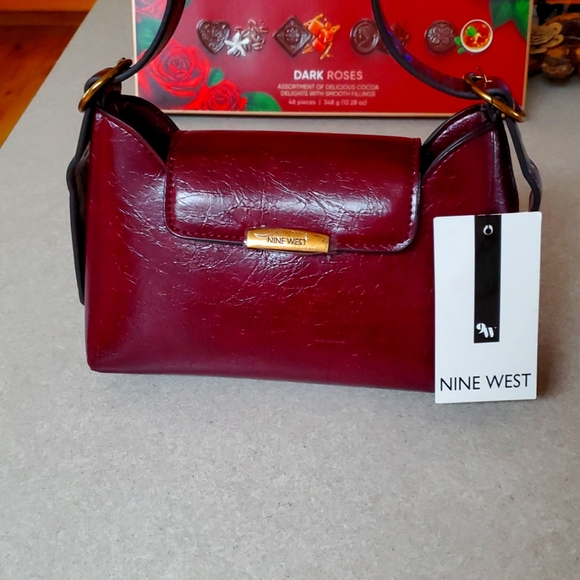 Nine West Handbags - Nine west mini purse 9"w x 6" h burgundy NWT